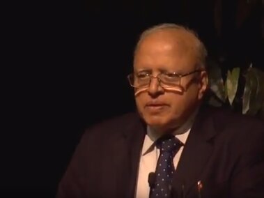 Dr. M. S. Swaminathan on stage during his lecture.