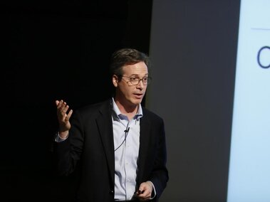 Dr. Anthony Leiserowitz on stage during his lecture.